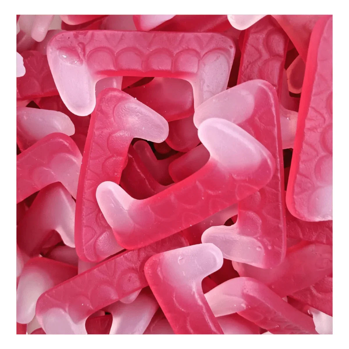 Gummy Galaxy Dracula Teeth jelly sweets showing bright red and white tooth-shaped candies in a clear bag.