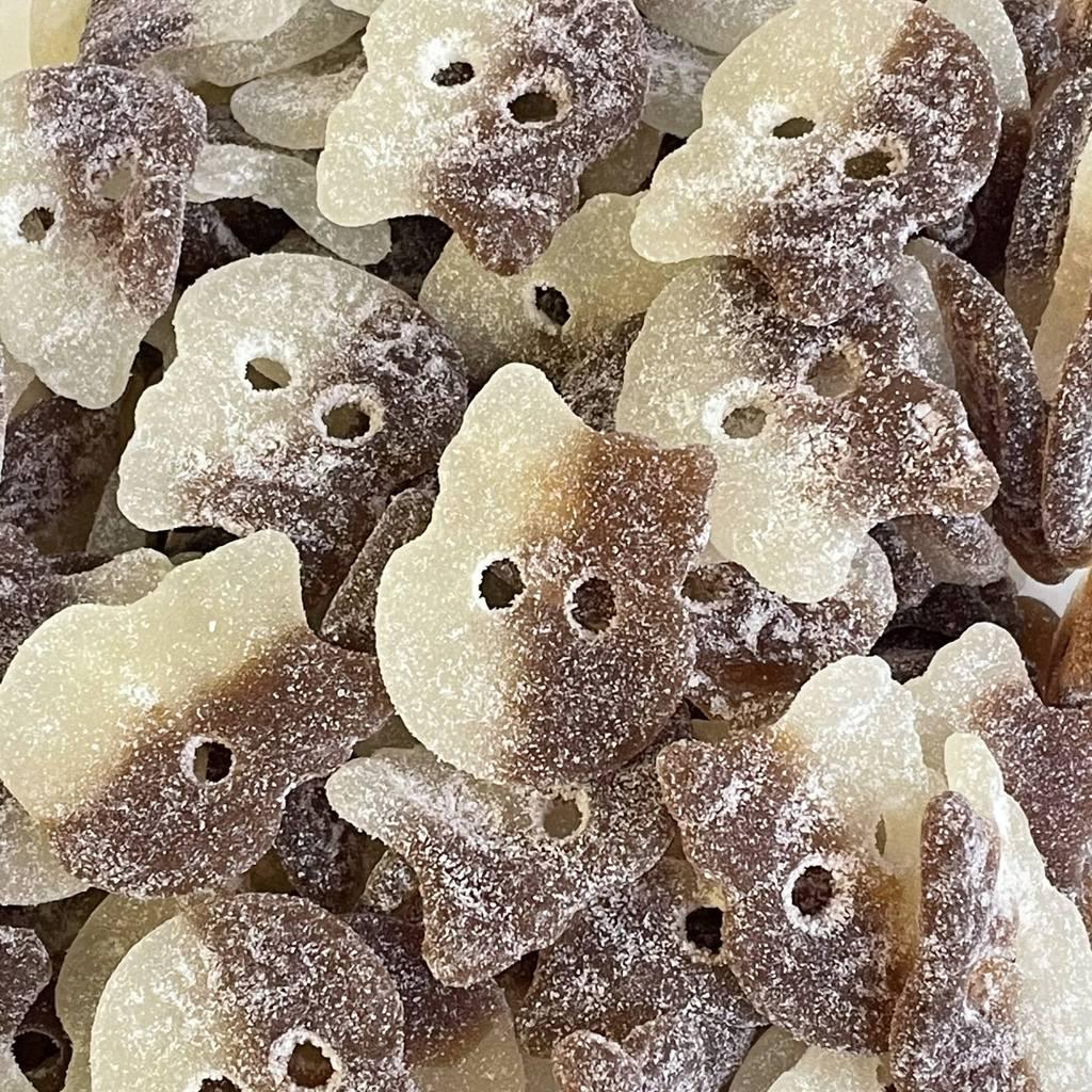 Assorted vegan cola skull gummies by Gummy Galaxy in a clear plastic bag, featuring detailed skull shapes and dark cola flavor.